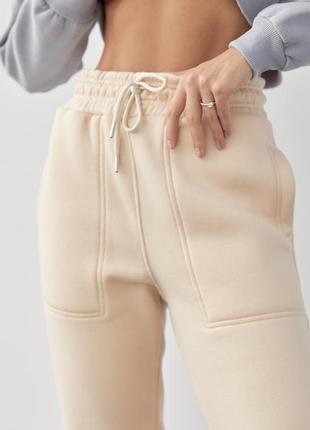 Жіночі теплі джогери з кишенями3 фото