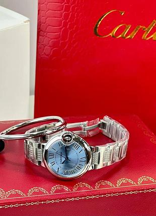 Часы наручные женские серебристые голубые брендовые в стиле cartier ballon 33 мм