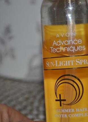 Зволожуючий спрей для волосся avon advance techniques sun-light spray5 фото