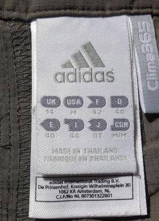 Спортивные капри с молниями и резинками внизу. clima365