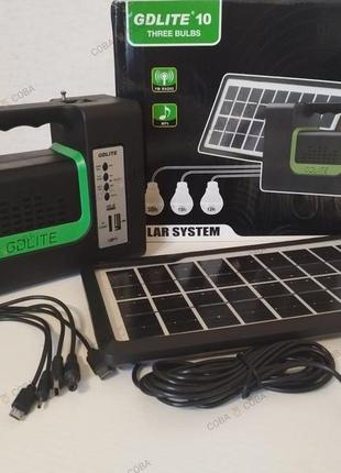 Ліхтар-прожектор gdlite gd-10, з powerbank 4000мач + fm-радіо + mp3-плеєр + сонячна панель + 3 лампи3 фото