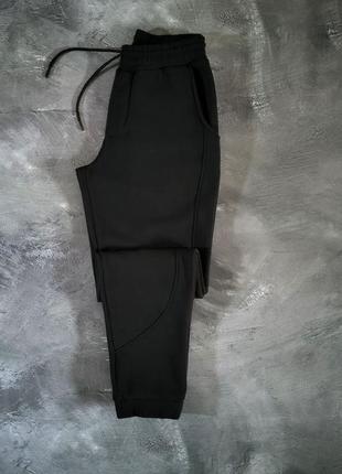 Чорні теплі спортивні штани чоловічі на флісі2 фото