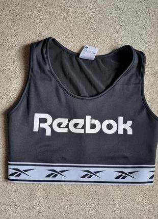 Спортивний топ бюстгальтер reebok classic vector light-impact bra eb50763 фото