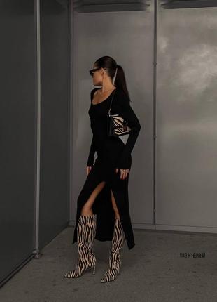 Жіноча чорна міді сукня в рубчик з розрізом