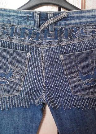 Круті сині джинси simurg, з декоративними рядками1 фото