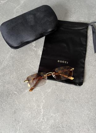 Солнцезащитные очки gucci gg1221s7 фото