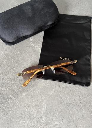 Солнцезащитные очки gucci gg1221s8 фото