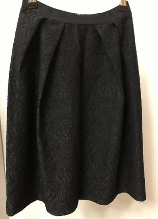 Спідниця міді