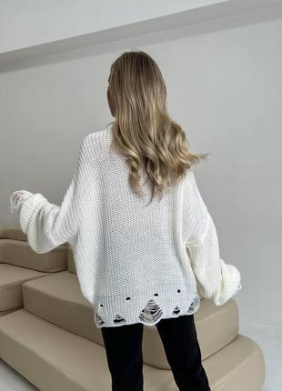 Женский свитер с дырками молочного цвета р.42/46 4072627 фото