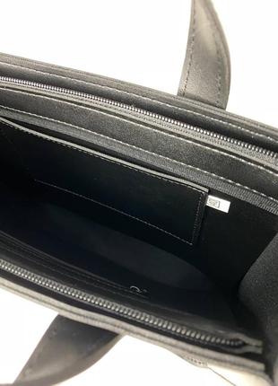 Черная женская вместительная сумка из экокожи с ручками и длинным широким ремнем5 фото