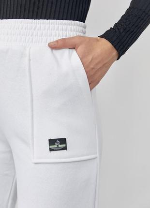 Трикотажные брюки на флисе с накладными карманами4 фото
