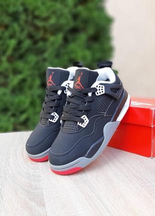 Зимові жіночі кросівки nike air jordan 4 retro winter psg black white fur чорного з білим кольорів хутро
