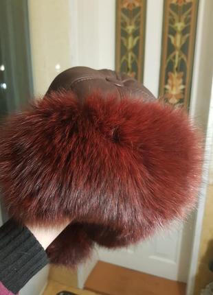 Шапочка ушанка теплая зимняя с бомбонами натуральная кожа и мех песец бордо3 фото