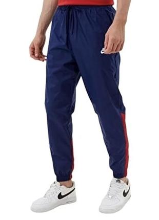 Спортивные штаны nike sportswear windrunner track pants1 фото