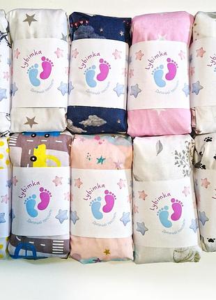 Простынь на резинке в детскую кроватку