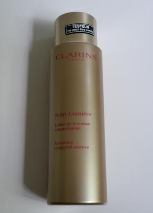 Лосьон для лица clarins nutri-lumiere renewing treatment essence 45+1 фото