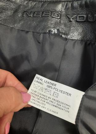 Стильная кожаная юбка с имитацией пояса люверсы8 фото