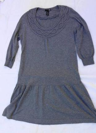 Трикотажное платье с косами.