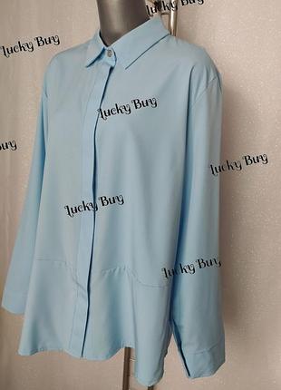 Жіноча блакитна сорочка з довгими рукавами. заміри в описі.