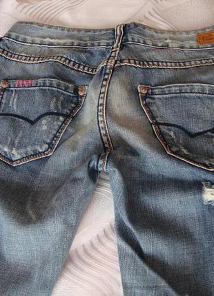 Круті рвані джинси silvian heach3 фото