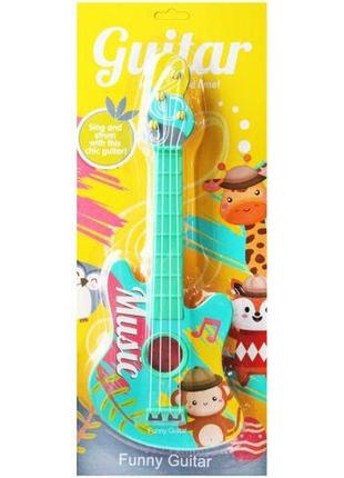 Музыкальная игрушка "гитара"1 фото