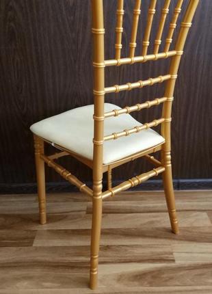 Дизайнерський стілець для весілля і банкету чиавари (к'яварі) з подушкою, золотий, пластиковий2 фото