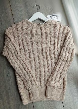 Бежева вовняна кофточка