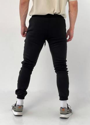 Спортивные штаны на флисе nike мужские утепленные черные3 фото