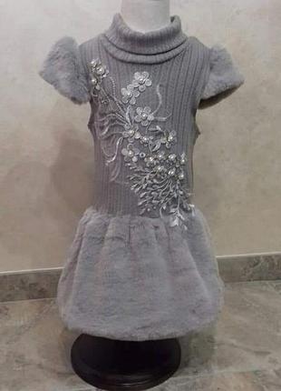 Тепленькая тунику.