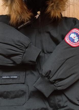 Очень теплый комбинезон на зиму известного бренда canada goose