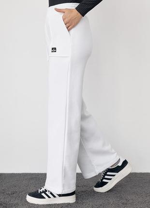 Трикотажные брюки на флисе с накладными карманами утеплены с начесом клеш широкие, широко ширенные белые бежевые черные клешь свободные свободные6 фото
