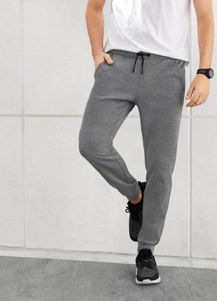 Спортивные штаны slim fit из плотного трикотажа для мужчины crivit 381213 s серый2 фото