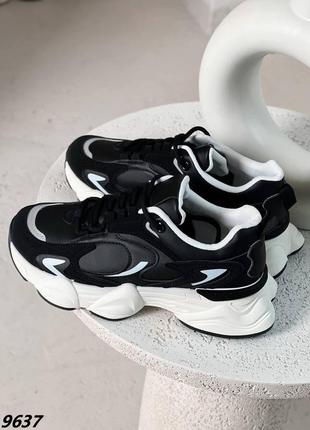 Черные стильные кроссовки с рефлективными вставками на белой массивной подошве2 фото