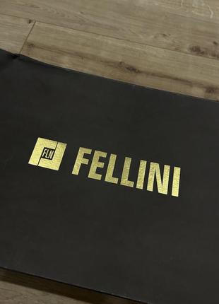 Кожаные сапоги fellini, состояние новый! демисезон. одевались пару раз.4 фото