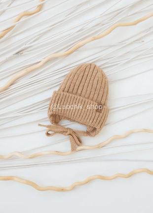 Детская зимняя шапочка на завязках бежевый меланж2 фото