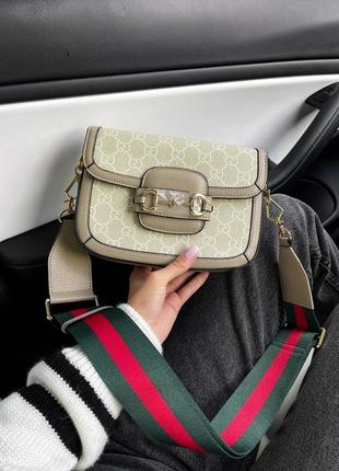 Шкіряна брендова сумка в стилі gucci