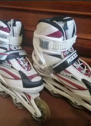 Фирменные роликовые коньки