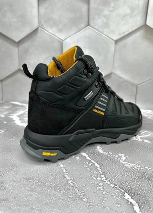 Мужские ботинки salomon
модель: s3 ч/ж

верх выполнен из высококачественной натуральной кожи
внутри: мех2 фото