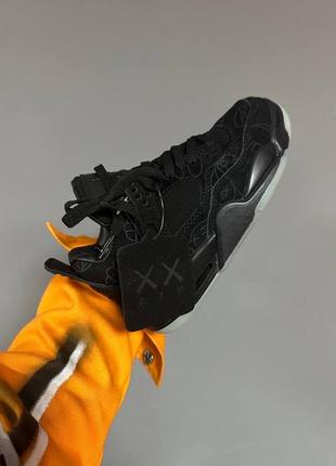 Кросівки nike air jordan 4 retro x kaws black premium3 фото