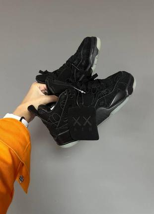 Кросівки nike air jordan 4 retro x kaws black premium1 фото