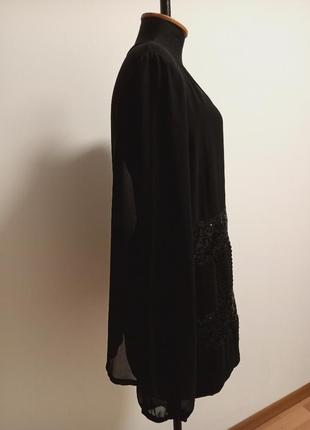 Полупрозрачная чёрная блузка с пайетками.2 фото