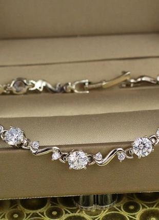 Браслет xuping jewelry хвиля з крупними білими каменями 19 см 5 мм сріблястий