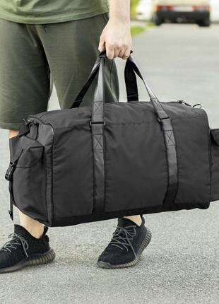 Вместительная мужская дорожная сумка сross черная тканевая на 55 литров