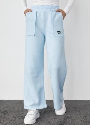 Трикотажные брюки на флисе с накладными карманами2 фото