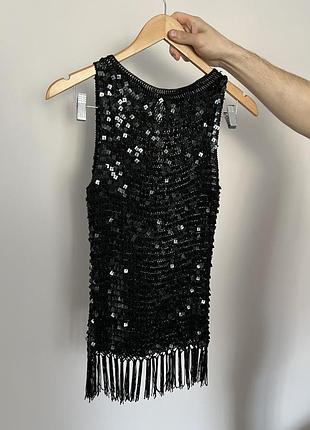 Блузка в паєтках