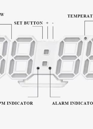 Часы настольные с белой подсветкой черные.2 фото