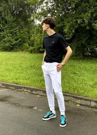 Белые спортивные мужские штаны4 фото