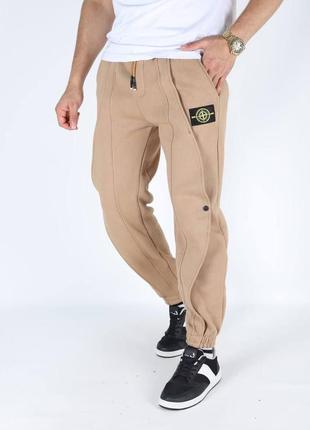 Штани stone island
