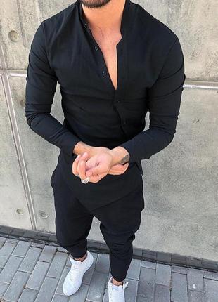 Рубашка мужская черная на пуговицах оригинального кроя2 фото