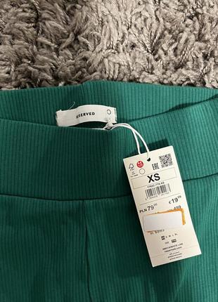 Зеленые брюки с разрезами2 фото